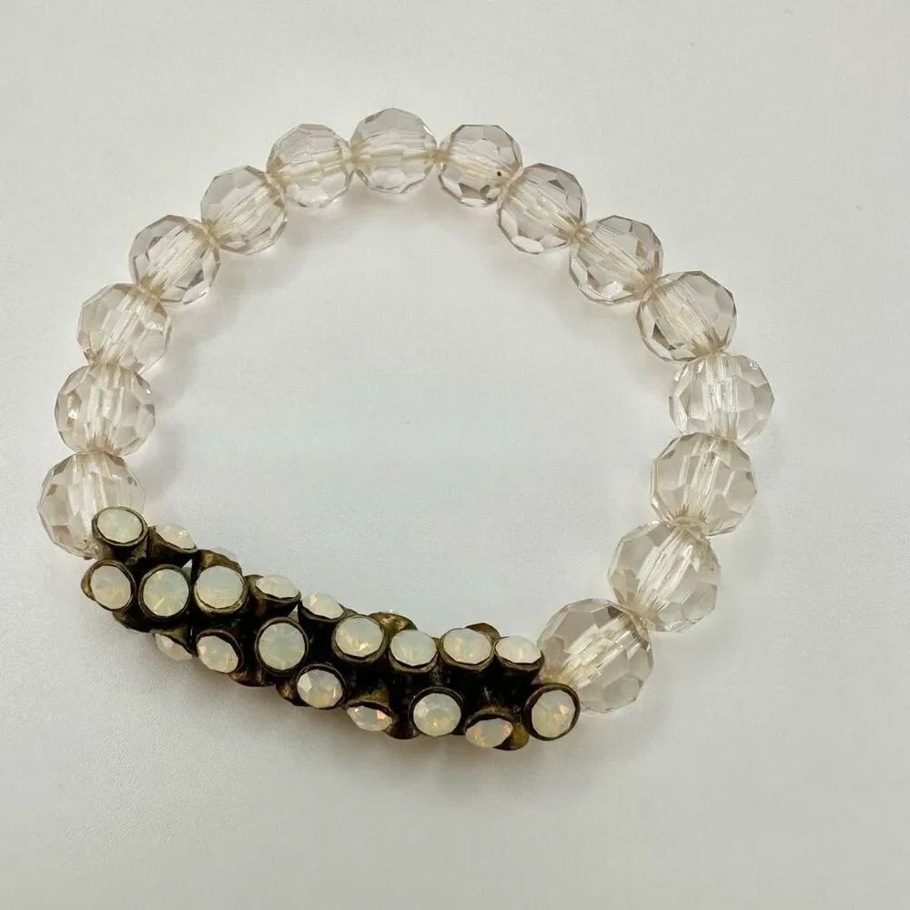 Clear and gold tone beaded stretchy bracelet